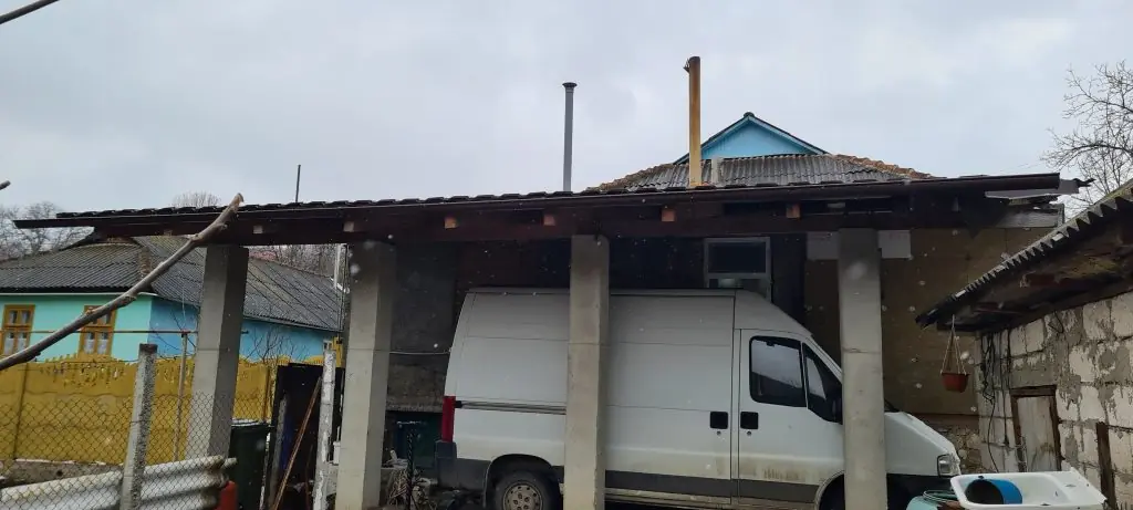 Schimb de ardezie pe șindrilă bituminoasă